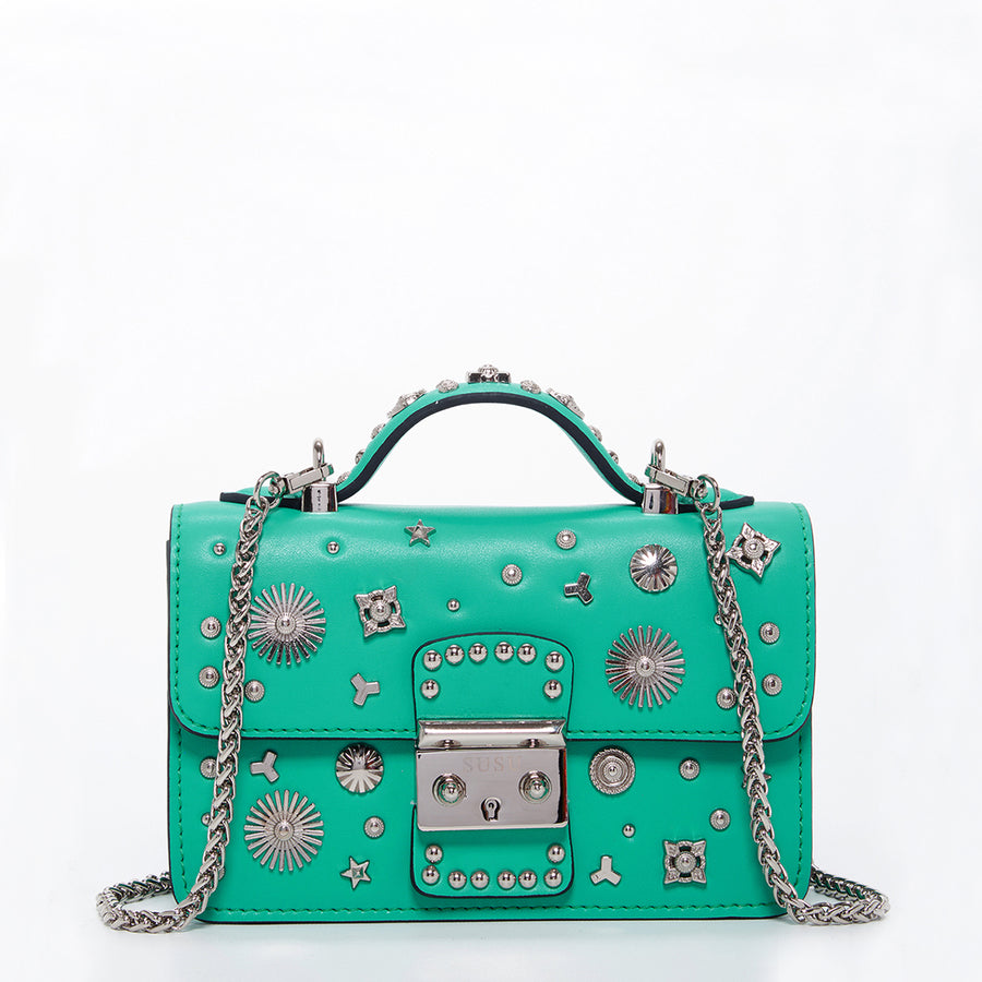 green purse with studs  