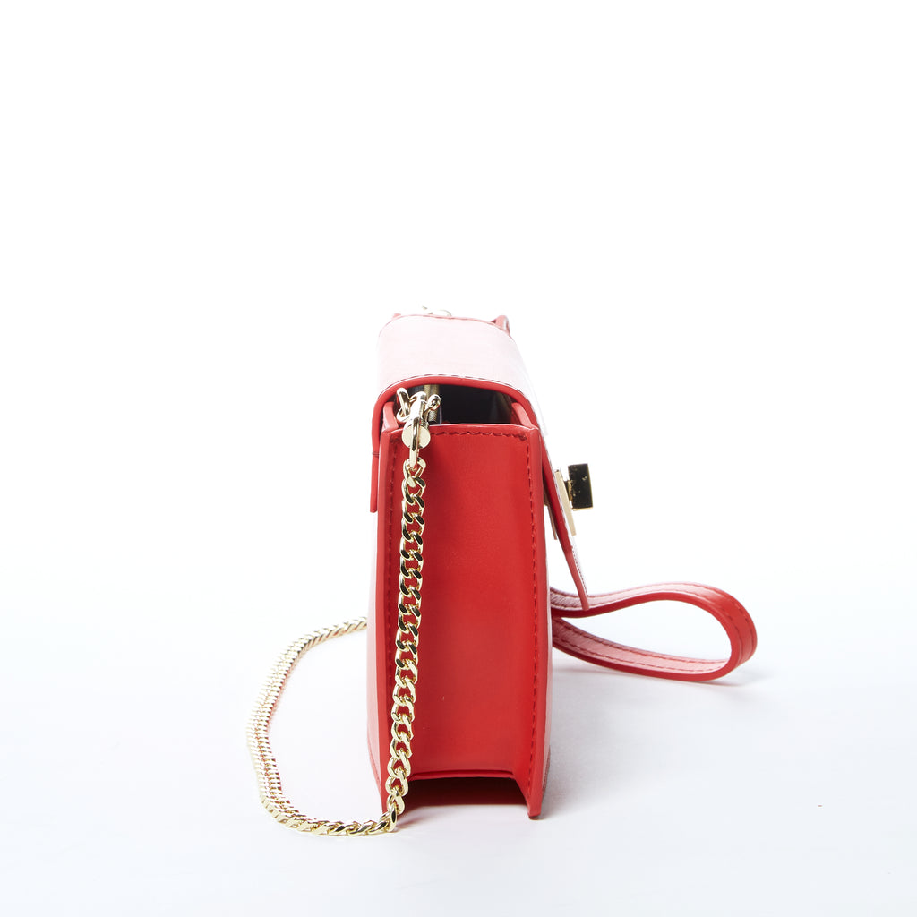 Red crossbody bag with gold chain top