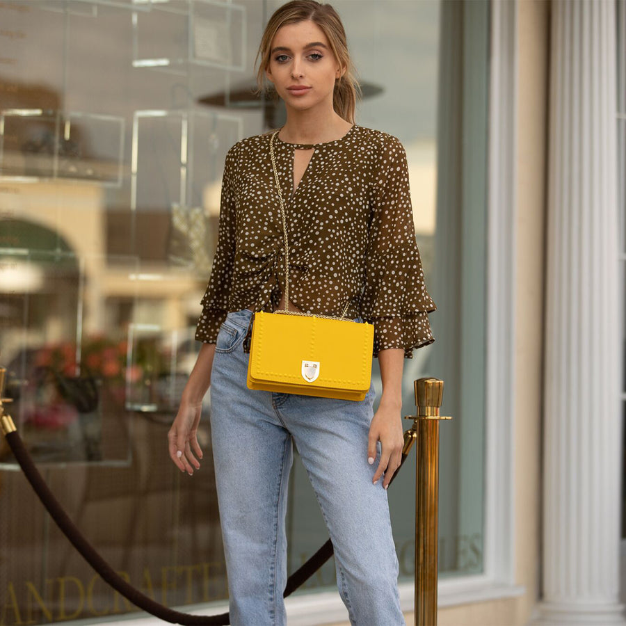 yellow sweater, skinny jeans, taupe booties, white purse outfit 3 - Putting  Me Together
