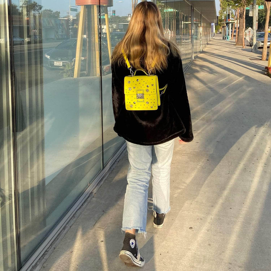 yellow leather backpack purse